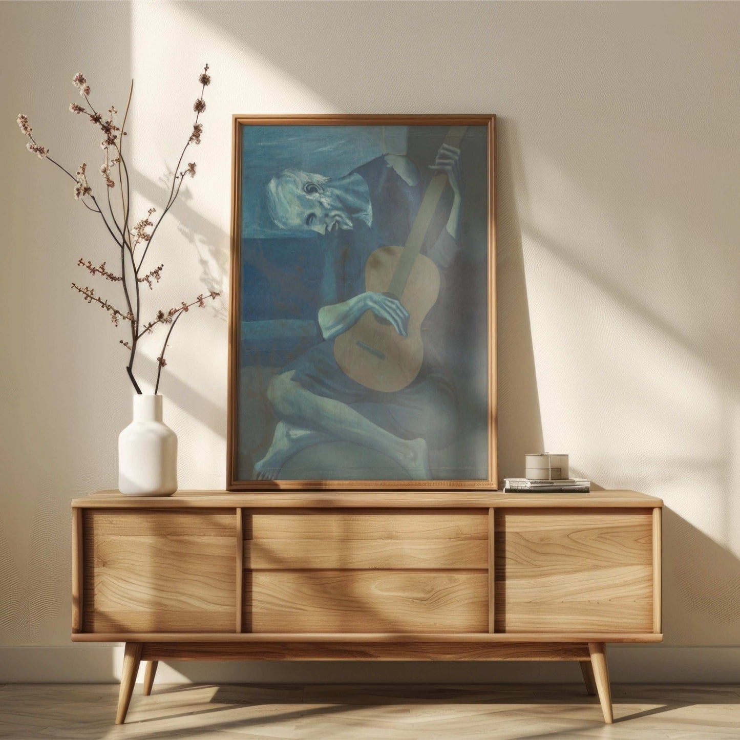 The Old Guitarist by Pablo Picasso